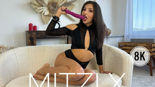 Mitzi Masturbates Her Pussy With A Pink Dildo